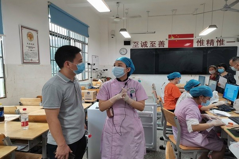 新冠疫情防控，民进人奋斗在前线